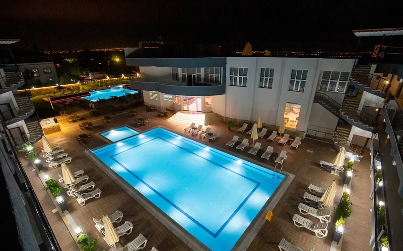 Pool and waterslide at Anya Resort Hotel in Pamukkale village near the Pamukkale hot springs