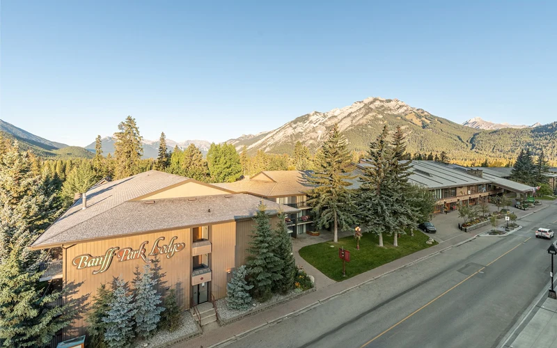 Indoor pool and mountain-view rooms at Banff Park Lodge near the Banff Upper Hot Springs, Alberta