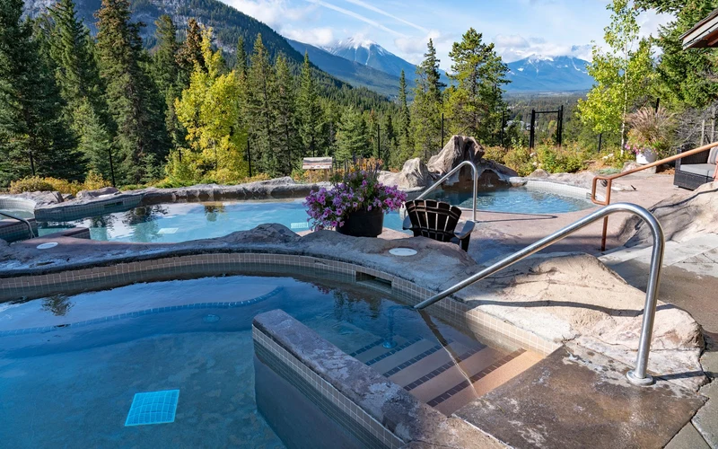 Communal hot tubs with valley views at Hidden Ridge Resort on Tunnel Mountain near the Banff Upper Hot Springs, Alberta