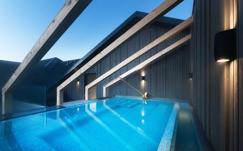 Rooftop warm pool over the marina at Hotel Berg in Keflavík, a hotel base for Iceland hot springs on Reykjanes