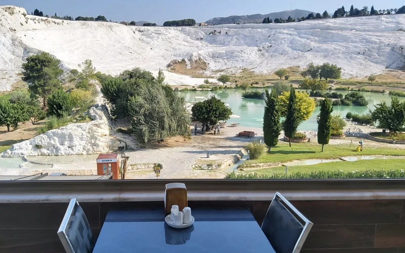 Terrace and outdoor pool at Hotel Sahin in Pamukkale village, a walk from the Pamukkale hot springs travertines