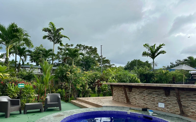 Garden pool and volcano view at Hotel Secreto in La Fortuna town, a base for the La Fortuna hot springs, Costa Rica
