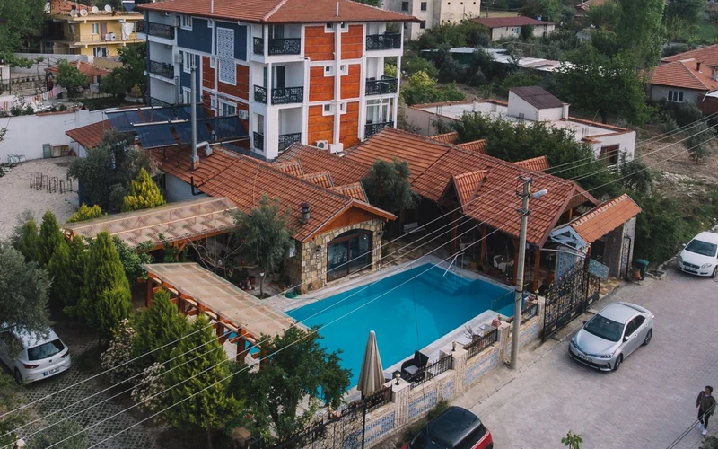Stone dining terrace and pool at Melrose House Hotel in Pamukkale village near the Pamukkale hot springs