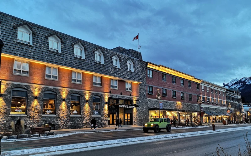 Redbrick facade of the Mount Royal Hotel on Banff Avenue, the closest hotel to the Banff Upper Hot Springs, Alberta