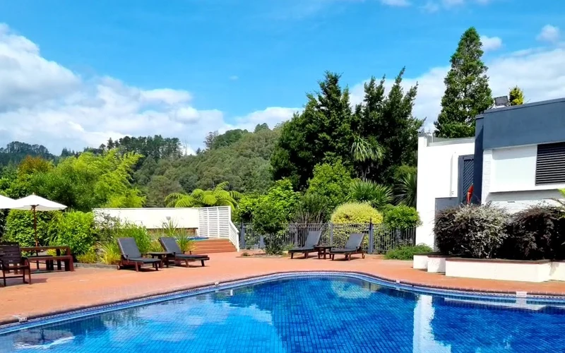 Rydges Rotorua heated outdoor pool near Whakarewarewa, Rotorua hot springs hotels, New Zealand
