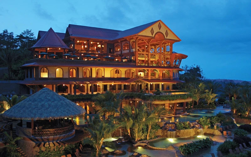 Terraced thermal pools on the hillside at The Springs Resort & Spa, the Arenal hot springs near La Fortuna, Costa Rica