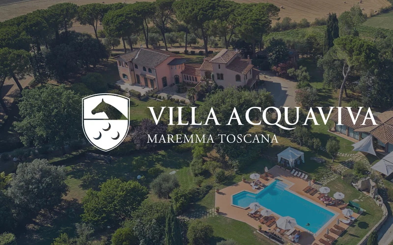 Vineyard villa and outdoor pool at Villa Acquaviva Wine Resort near the Saturnia hot springs, Tuscany